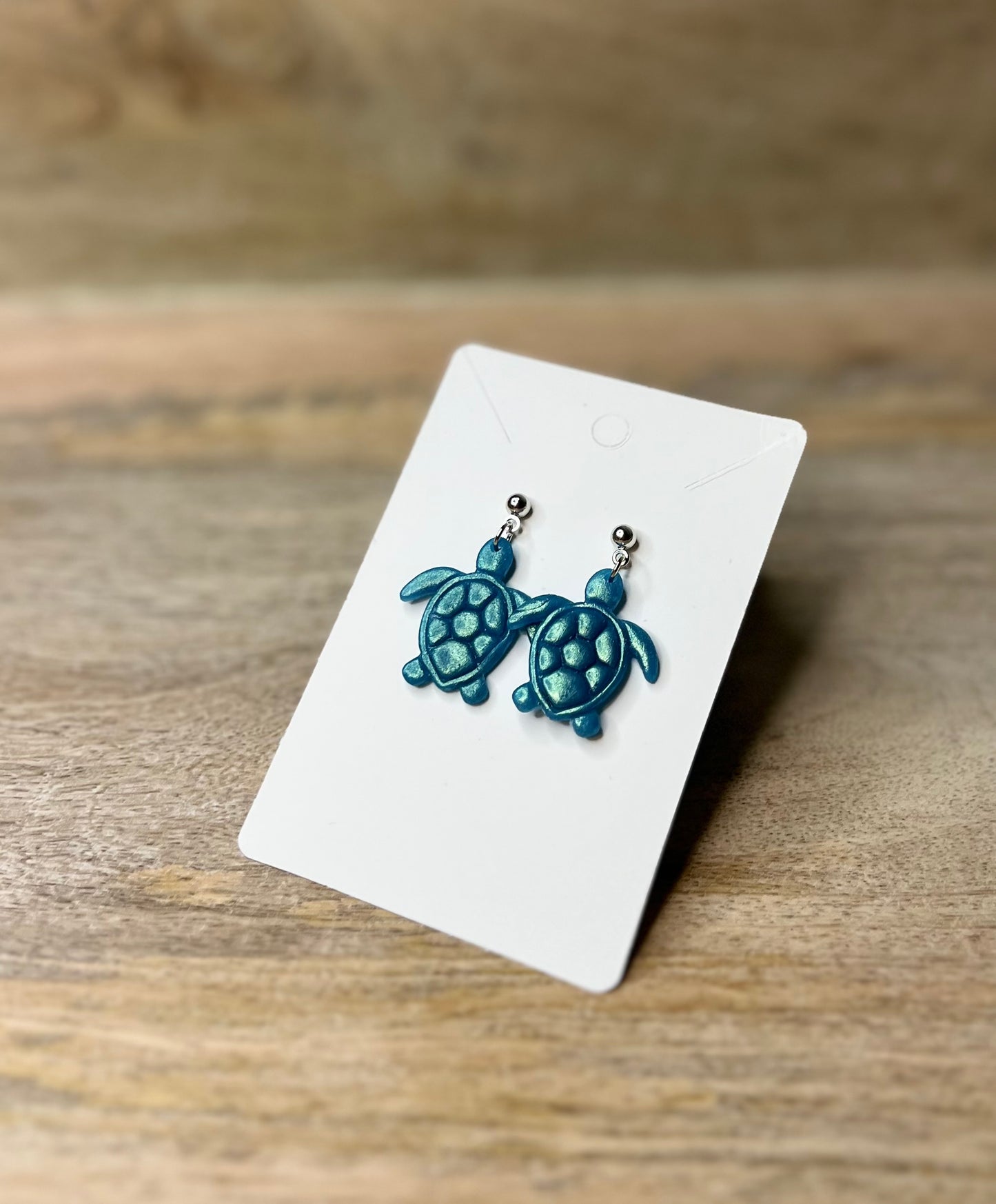 Turquoise metallic sea turtles